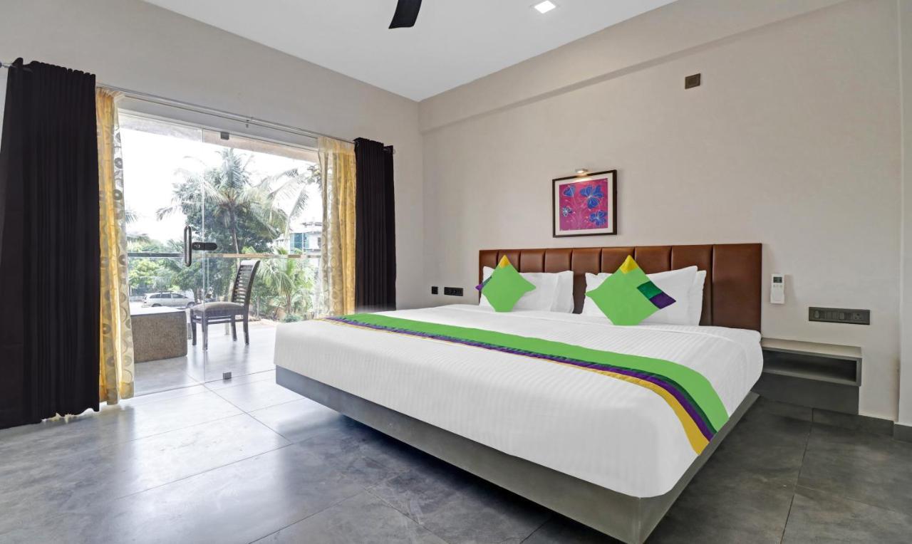 Treebo Grand Vistara Airport Suites Kochi Bagian luar foto