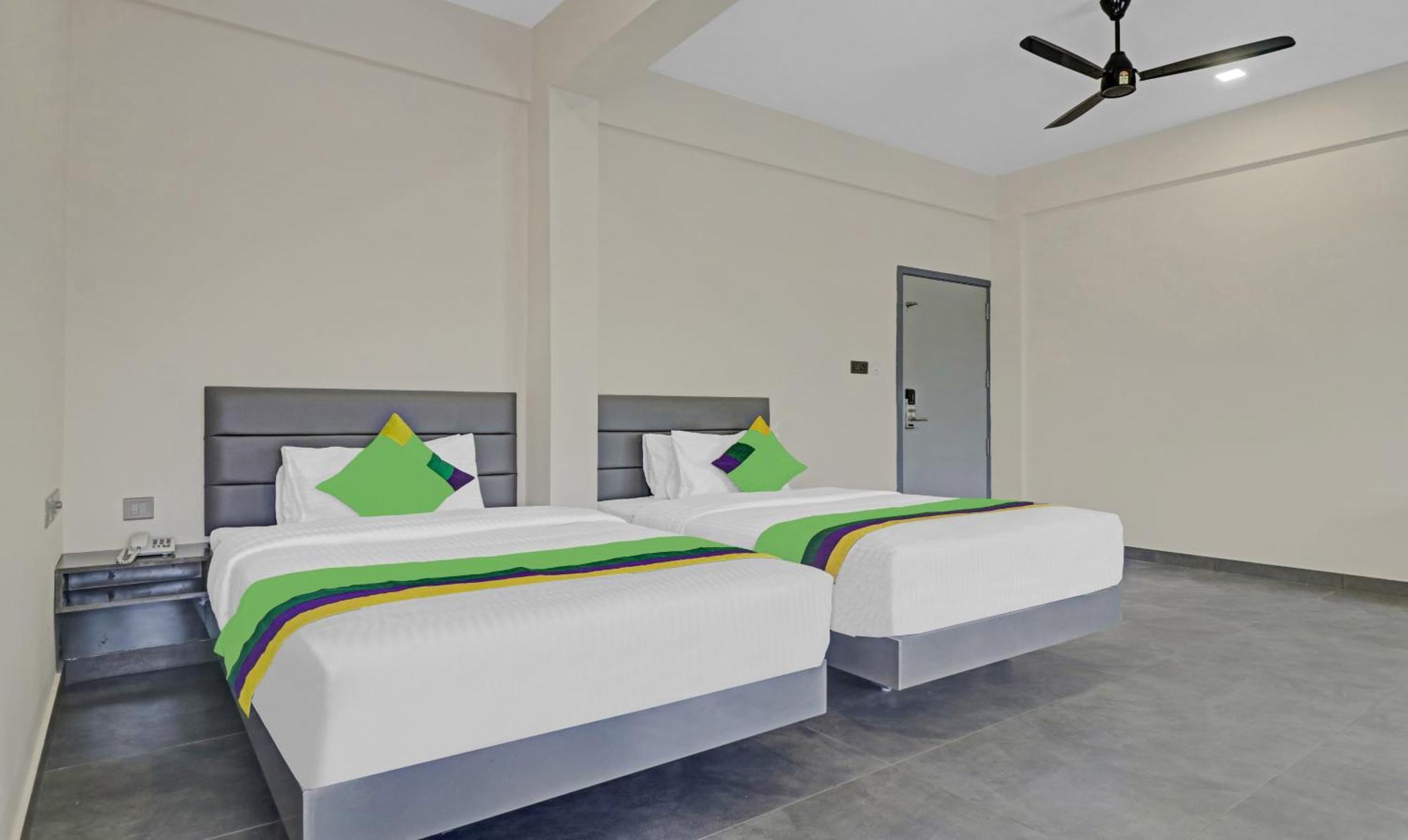 Treebo Grand Vistara Airport Suites Kochi Bagian luar foto