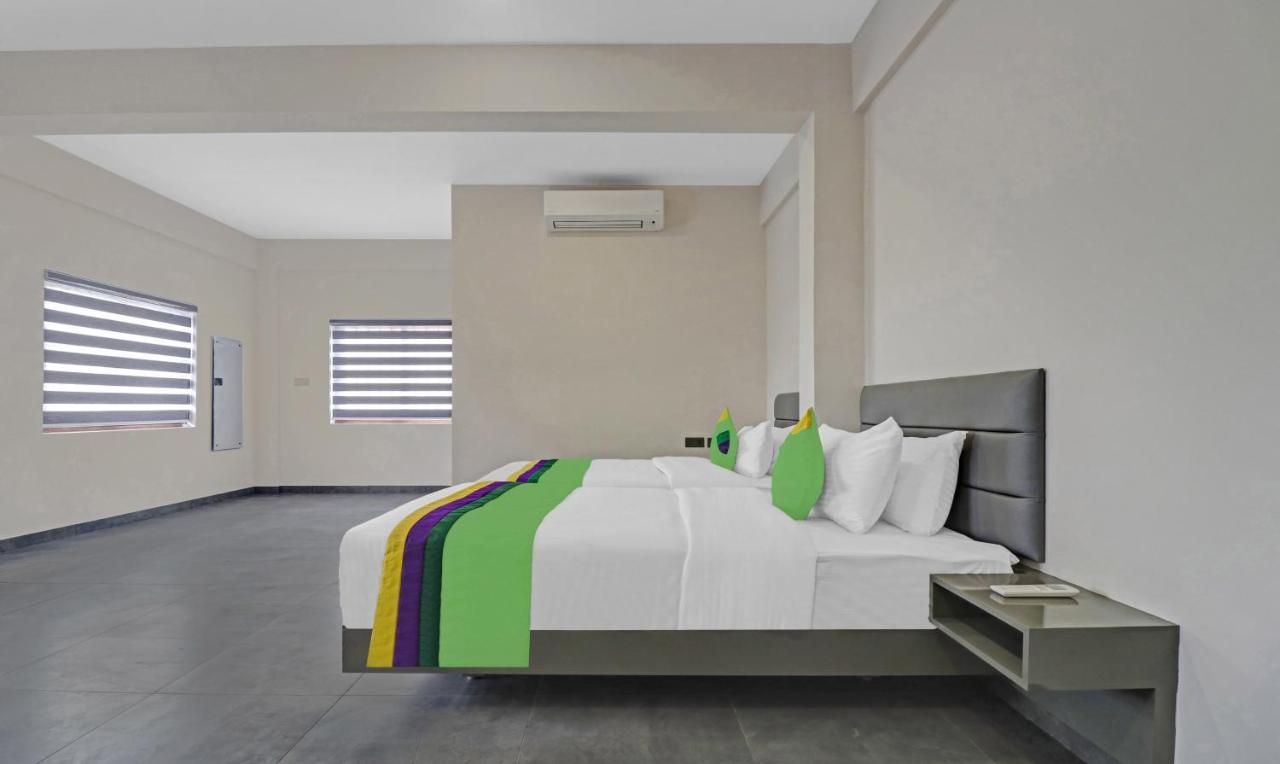 Treebo Grand Vistara Airport Suites Kochi Bagian luar foto